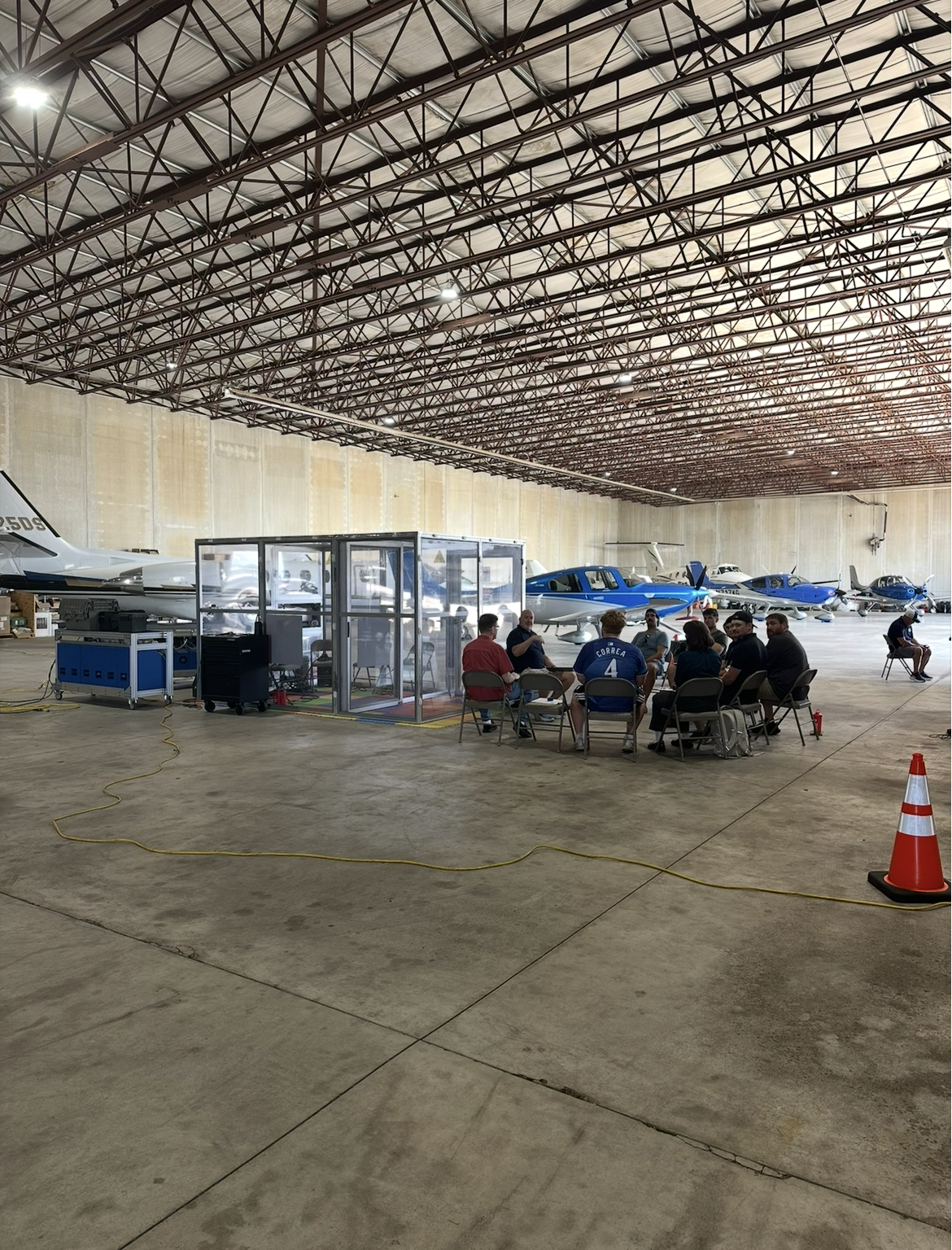 Inflight members during a briefing for PROTE hypoxia training